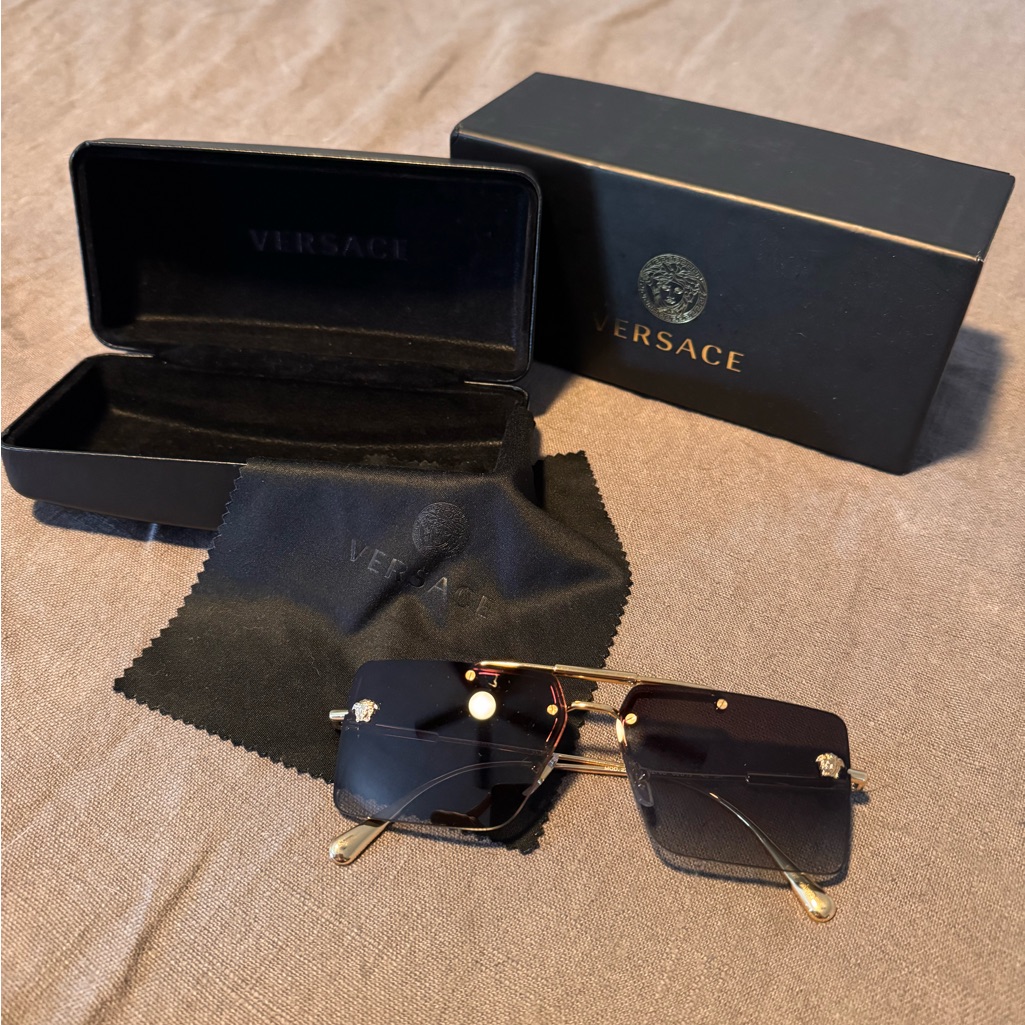 Versace Gold And Black Rimless Sunglasses